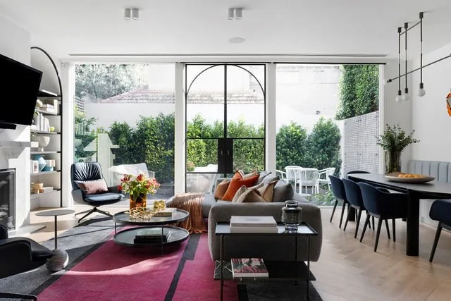 Balmerino, Mount Eliza. Living and dining opening to the garden.
