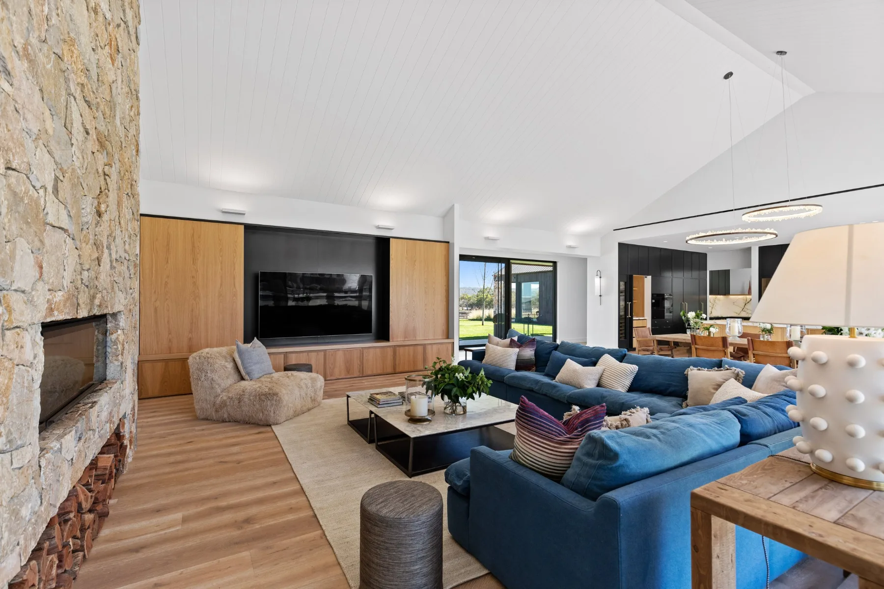 Casalinga Estate, Dromana. Living room around the stone fireplace.