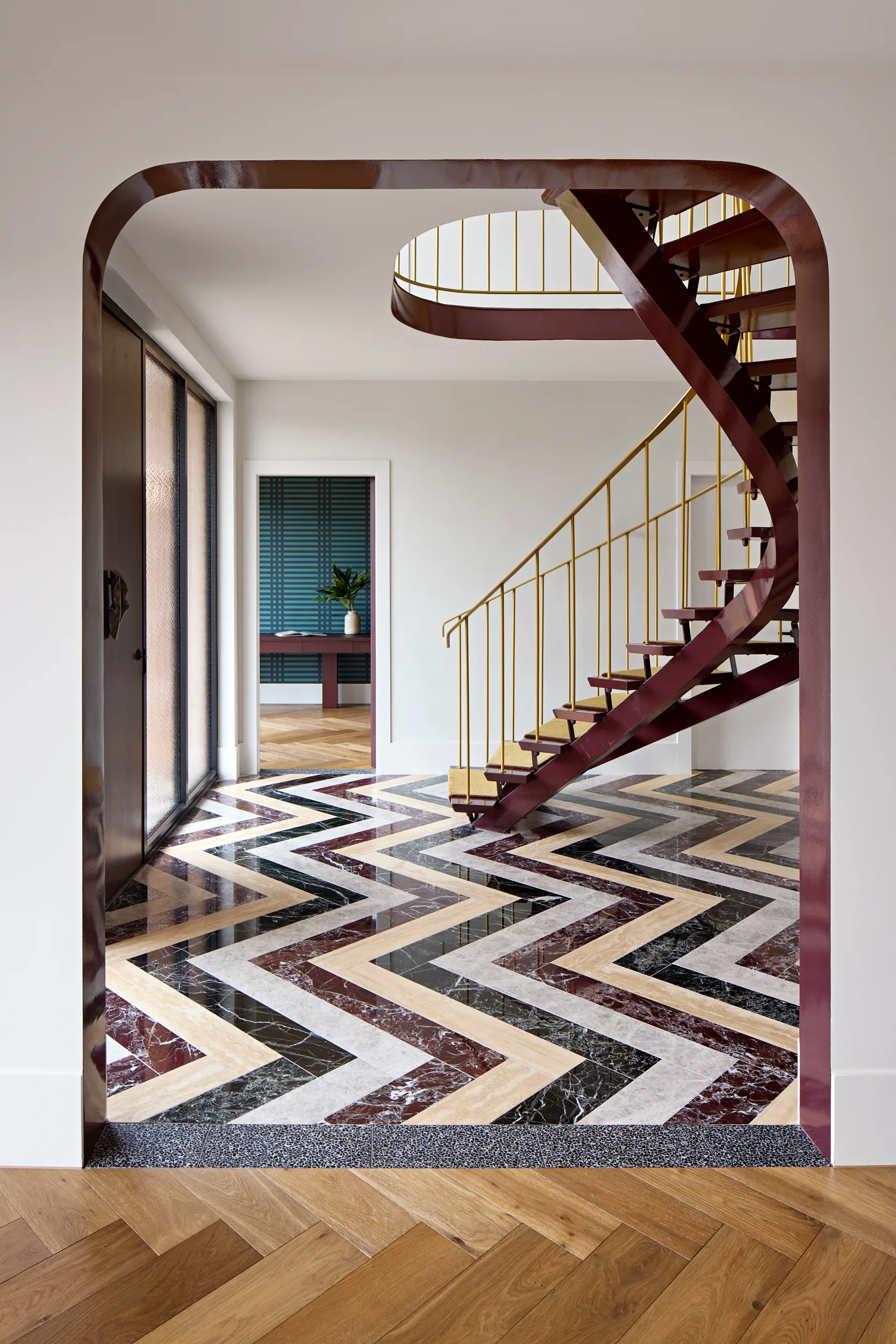 Caulfield. Entry stair over the chevron floor.