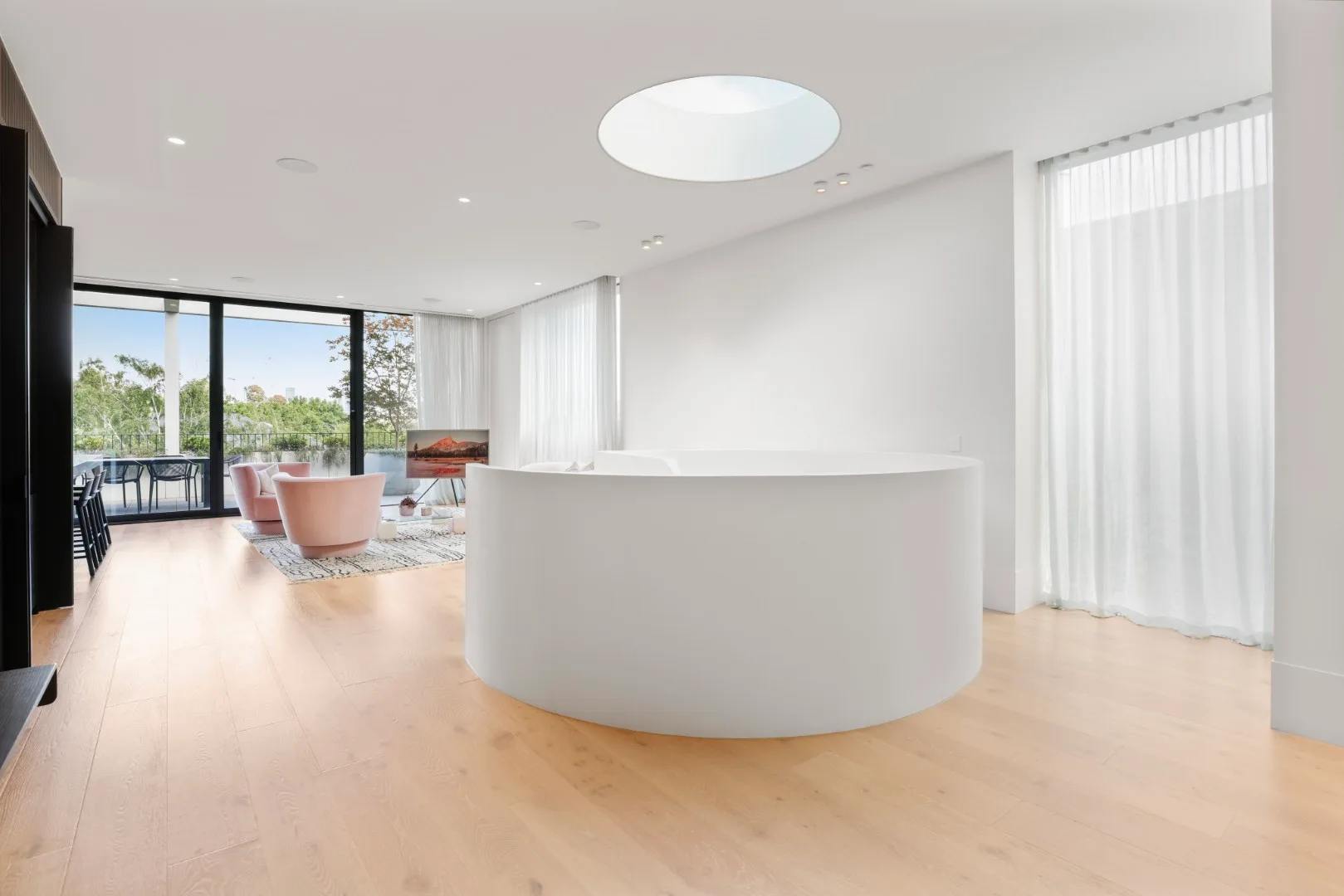 Cloverdale. Living room with the curved island beyond.
