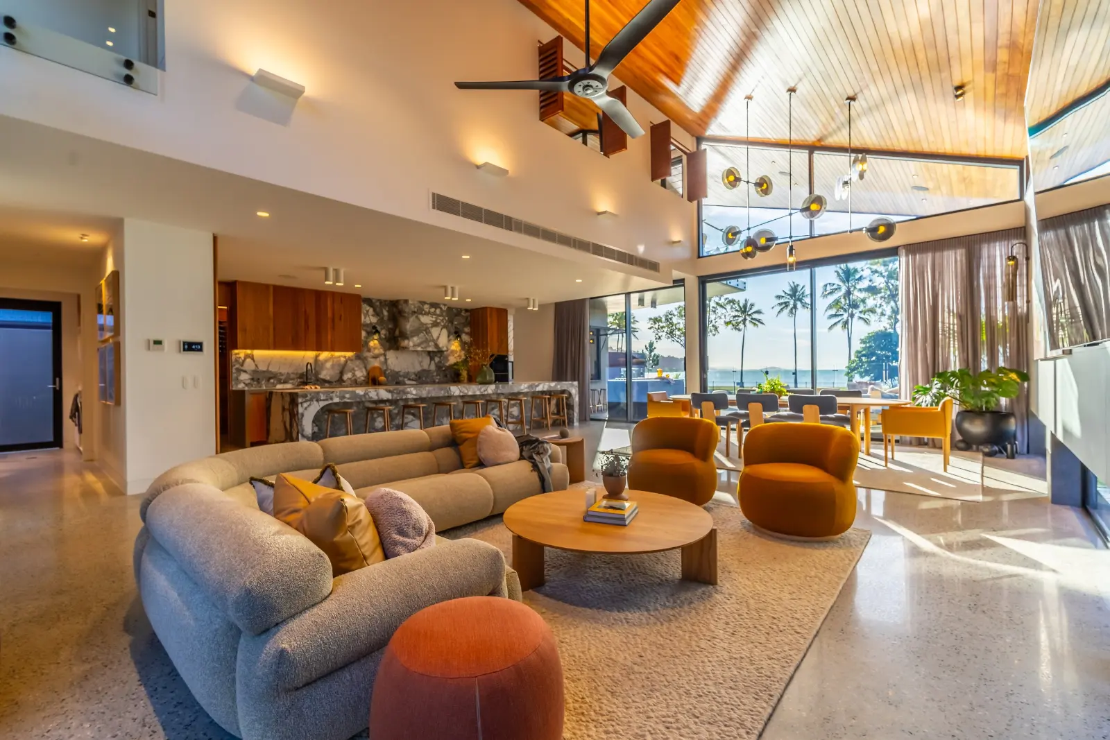 Larimar, Whitsundays. Living room under the timber ceiling.